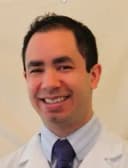 Dr. Adam Gatan