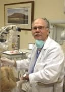 Dr. Charles New