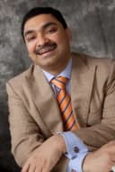 Dr. Saju George