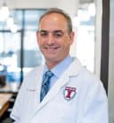 Dr. Tevyah Dines