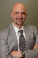 Dr. Yaser Roumani